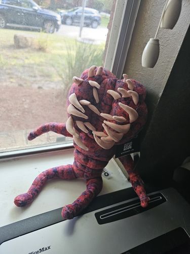 Customer photo review of The GTFO Baby Striker Plushie