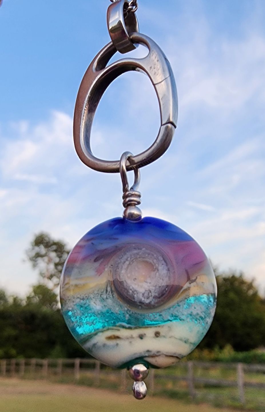 Customer photo review of Ocean Wave Sunset Pendant with Cremation Ash