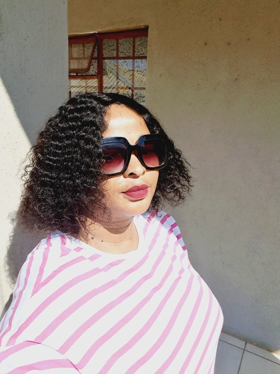 Customer photo review of Peruvian Curly Bob 12 inch Wig