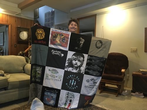 T-shirt quilt with travel, movies themes by Mary from MI