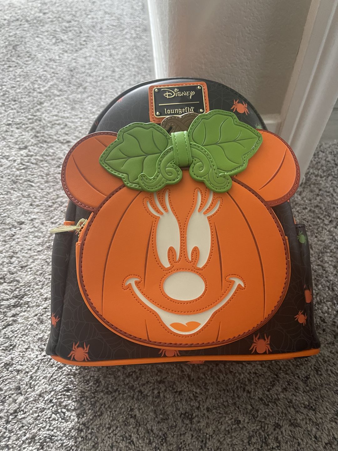 Customer photo review of 707 Street Exclusive - Loungefly Disney Glow in the Dark Pumpkin Minnie Mouse Mini Backpack