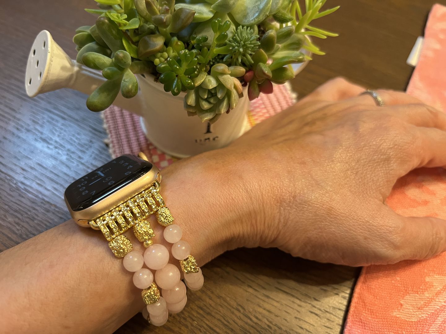 Customer photo review of Rose Quartz Stretch Apple Watch Strap