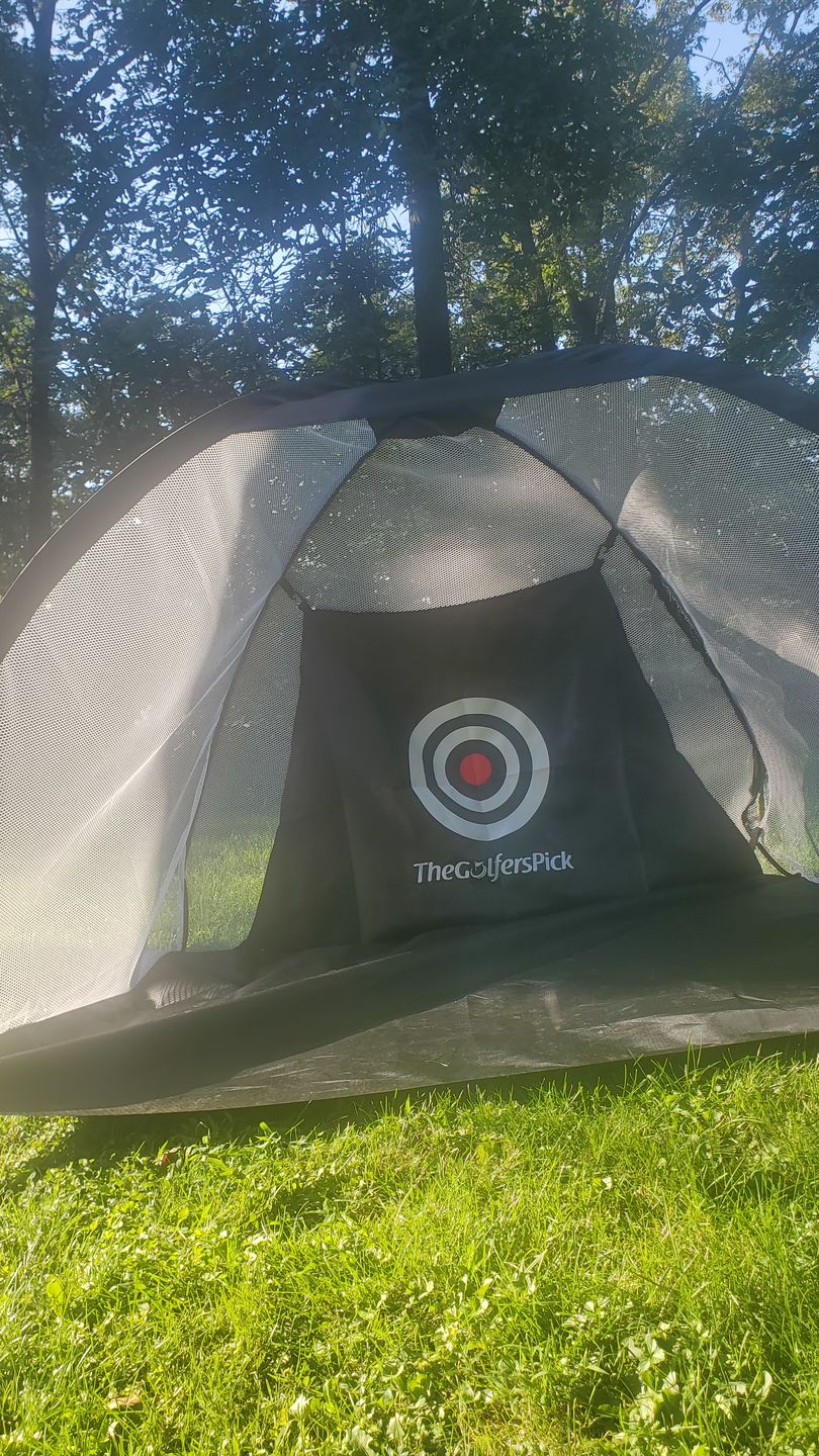 Customer photo review of Golf Practice Driving Net for Indoors and Outdoors | Tri-Turf Hitting Mat