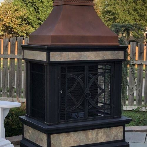 Customer photo review of Sunjoy Outdoor 57 in. Steel Wood Burning Fireplace with Fire Poker and Rain Cover