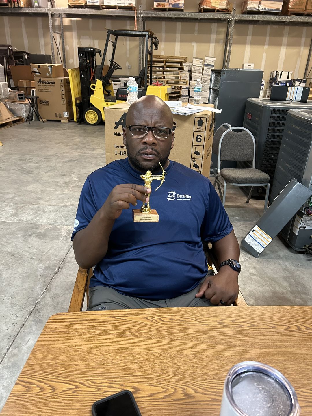 Customer photo review of IT AIN'T EASY BEING A BADASS trophy