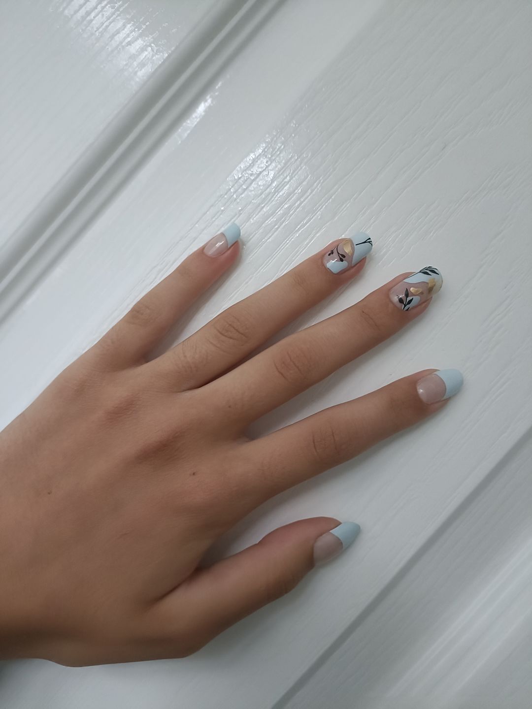 Customer photo review of Blue Floral Daze DIY Semicured Gel Nail Sticker Kit