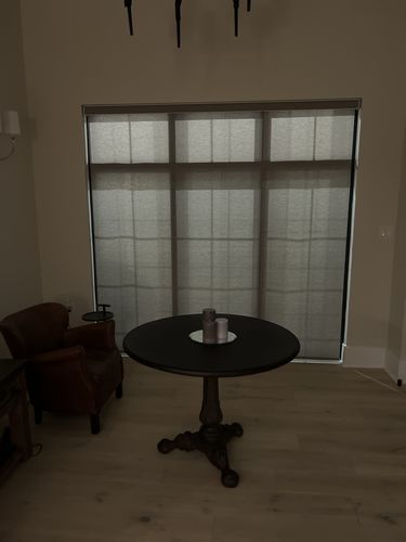 Customer photo review of SmartWings Motorized Light Filtering Roller Shades 70% Blackout Safari