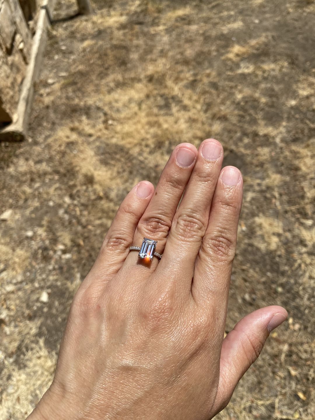Customer photo review of Louily Classic Emerald Cut Engagement Ring In Sterling Silver