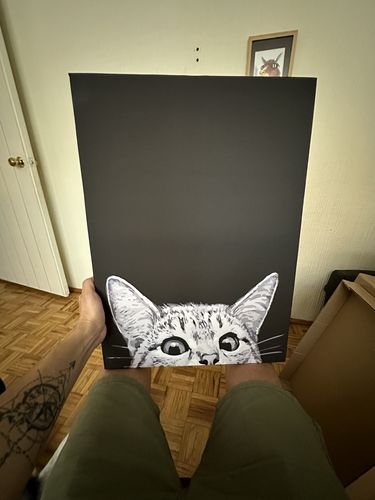 Customer photo review of El gato curioso