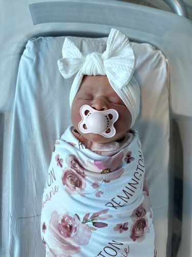 Customer photo review of Cable knit bow in white