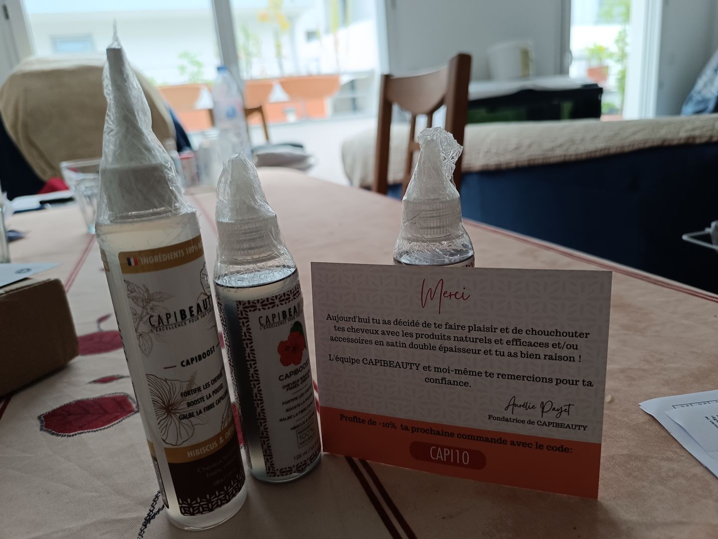 Customer photo review of Sérum Capiboost Hibiscus & Orties 120ml pour la pousse des cheveux bouclés frisés crépus