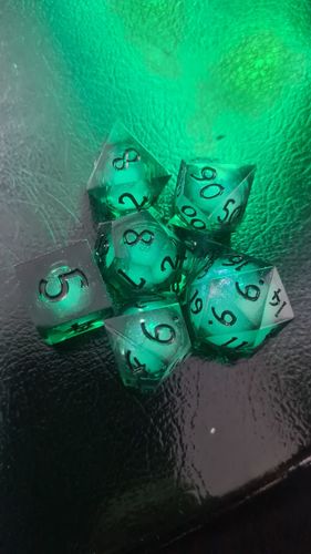 Customer photo review of Green Liquid Core Resin Galaxy DnD D&D Dice Set