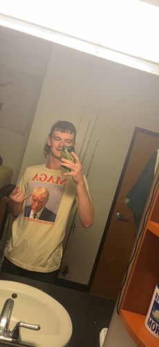 Customer photo review of MAGA My Ass Got Arrested (Trump Mugshot) Unisex t-shirt