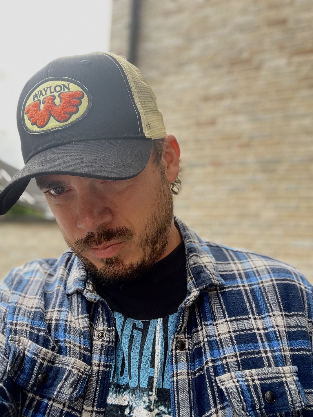 Customer photo review of Flying W Patched Waylon Jennings Trucker Hat