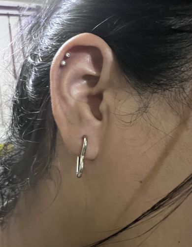 Customer photo review of Piercing 1era Perforación Cristal Titanio