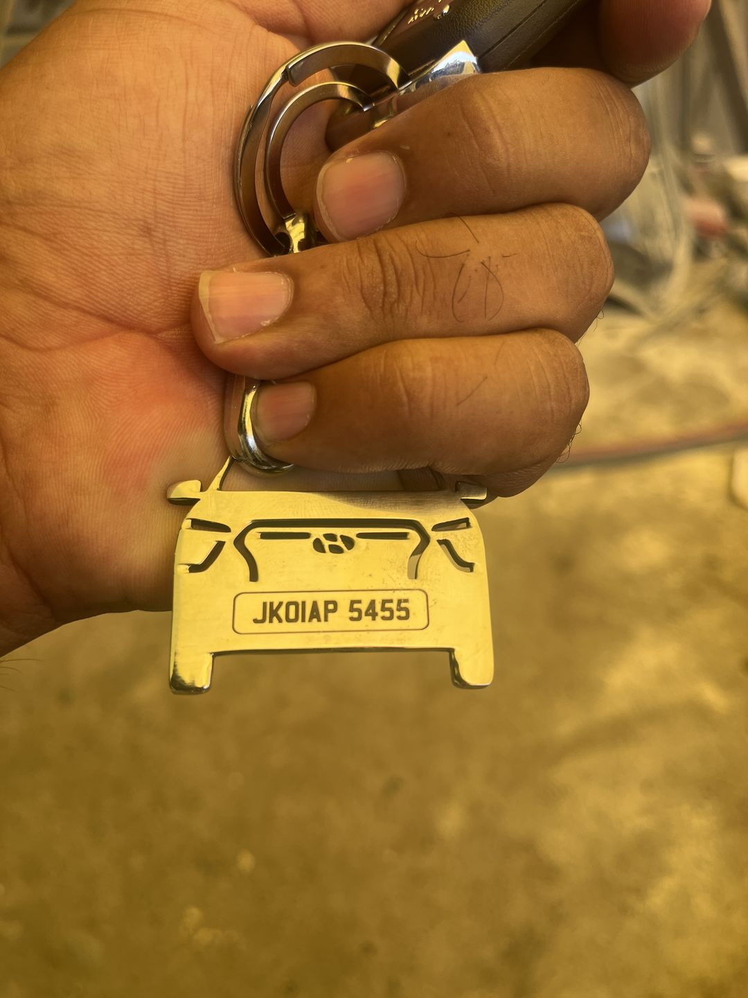 Customer photo review of Personalised Number Plate Car Keychain