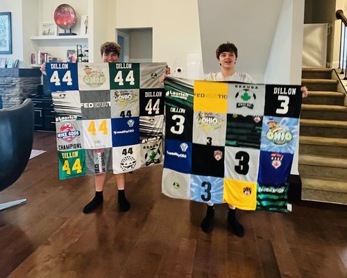 T-shirt quilt with sports, football themes by Elizabeth from OH