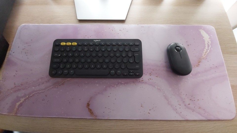 Customer photo review of Colourful Marble Keyboard and Mouse Mats - Larger