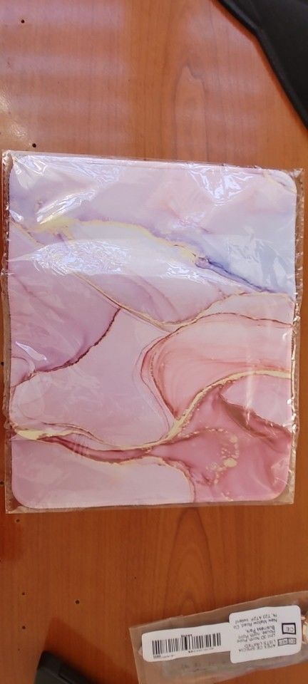 Customer photo review of Colourful Marble Keyboard and Mouse Mats - Larger