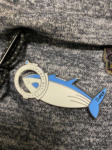 Customer photo review of BTS Jin Super Tuna x The Astronaut Enamel Pins