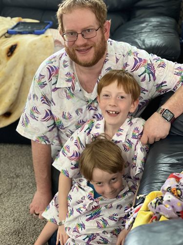 Customer photo review of Rainbow Dragons and Unicorns Youth Hawaiian Shirt