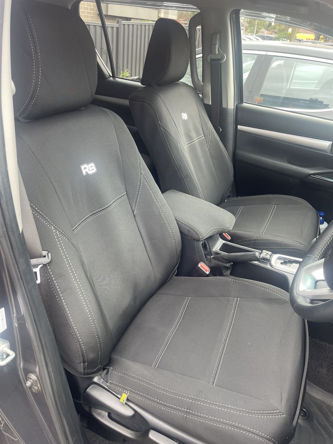 Customer photo review of Toyota HiLux 8th Gen Neoprene Armrest Console Lid Cover (In Stock)