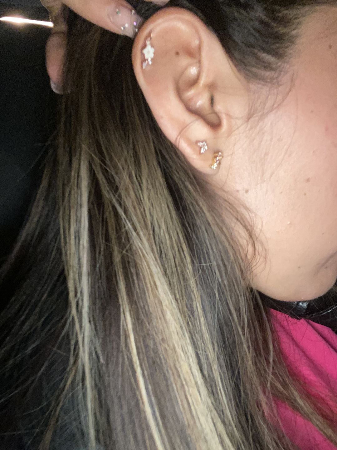 Customer photo review of Piercing de Florecita con Zirconias