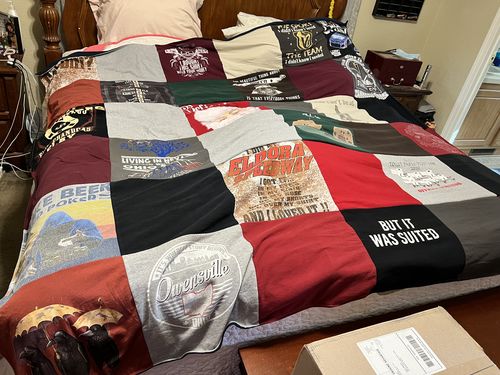 T-shirt quilt with sports, local history themes by Julia from NV