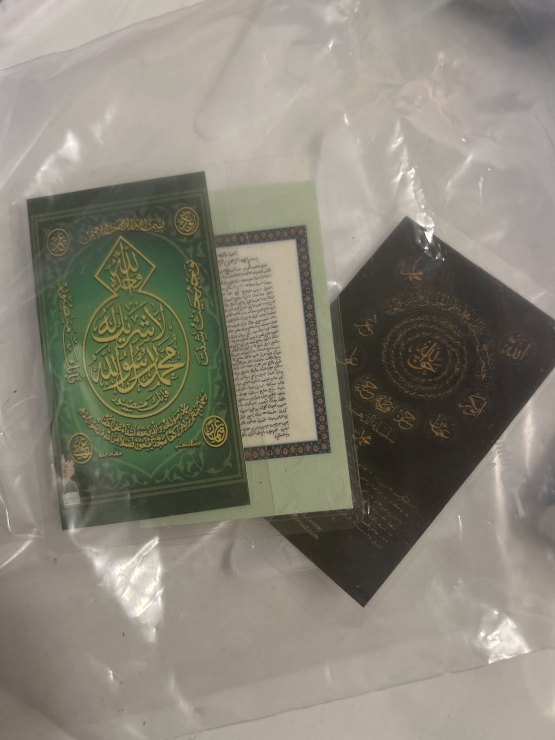 Customer photo review of Laminated Taweezes Pocket Wallet Small (1.5" x 2")