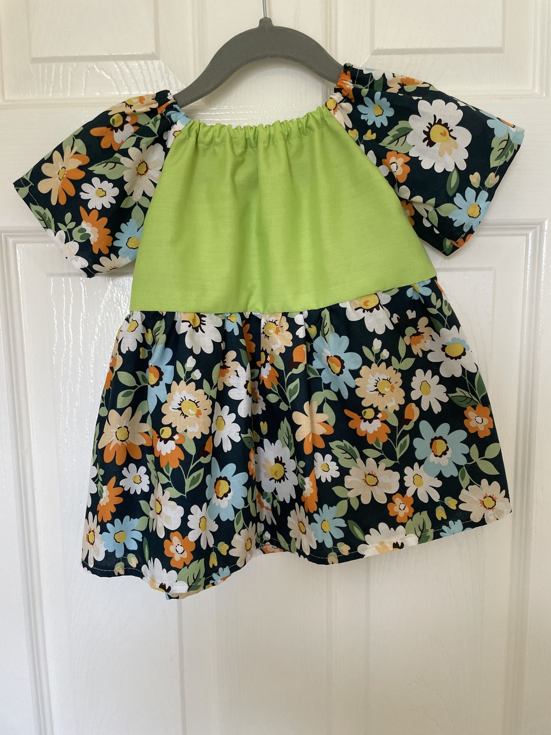 Customer photo review of Blue, Orange and White Floral on Navy Cotton Poplin Fabric