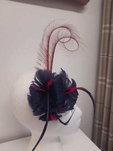 Customer photo review of Burnt curled pheasant feather for millinery fascinators and wedding hats FE011