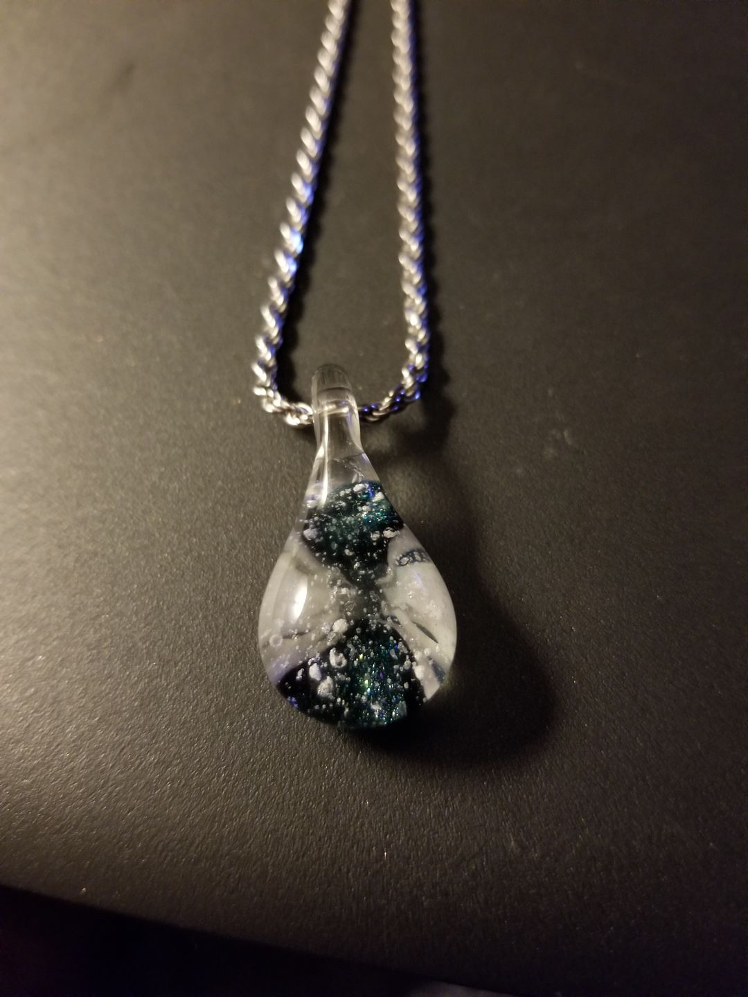 Customer photo review of Ocean Crash Pendant with Infused Cremation Ashes