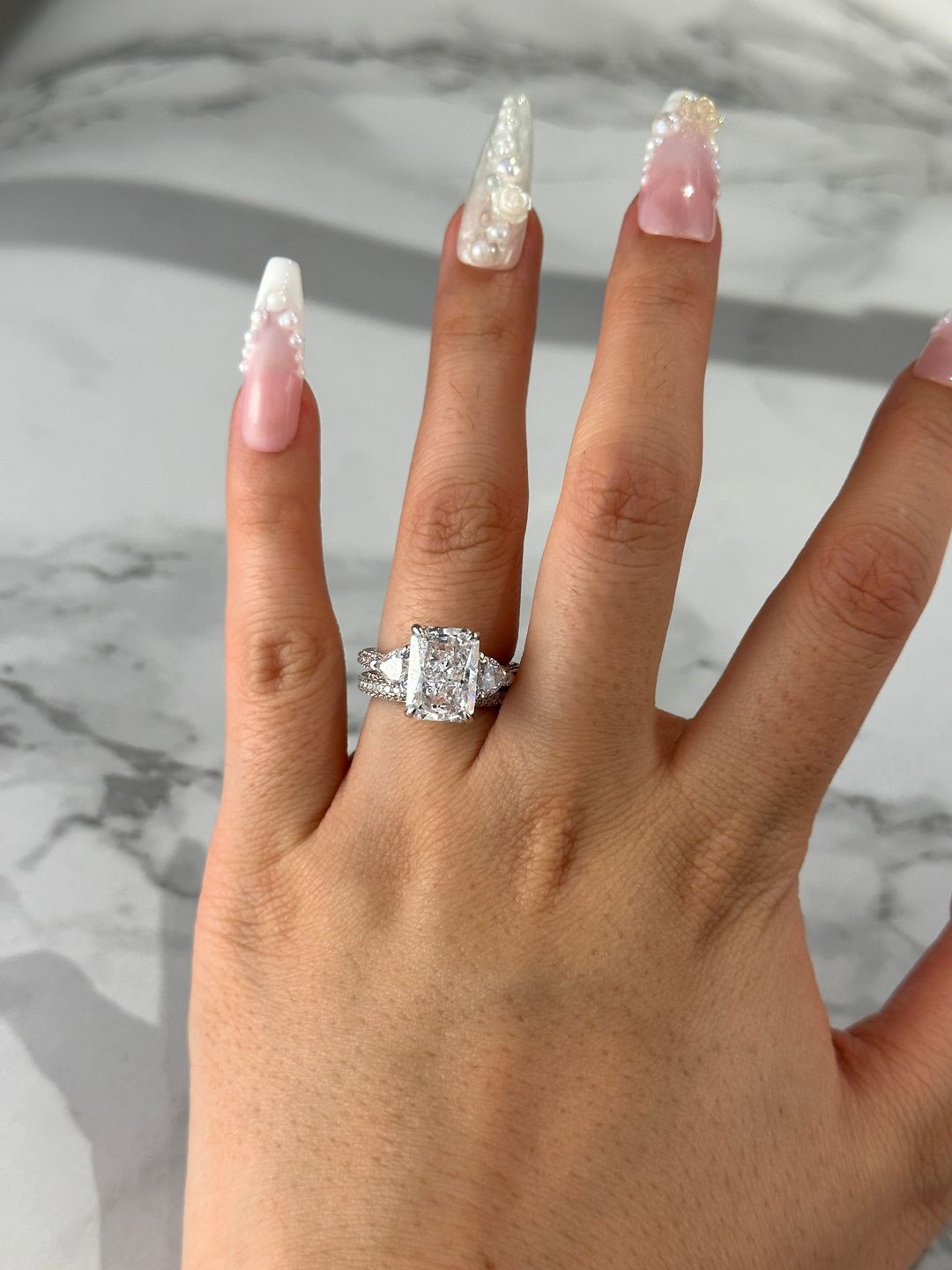 Customer photo review of S925 5.0Ct Radiant Cut & Heart Cut Three Stone Wedding Set In Sterling Silver