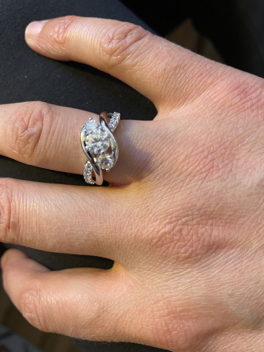 Customer photo review of Swirl Three Stone Moissanite Twisted Pave Engagement Ring