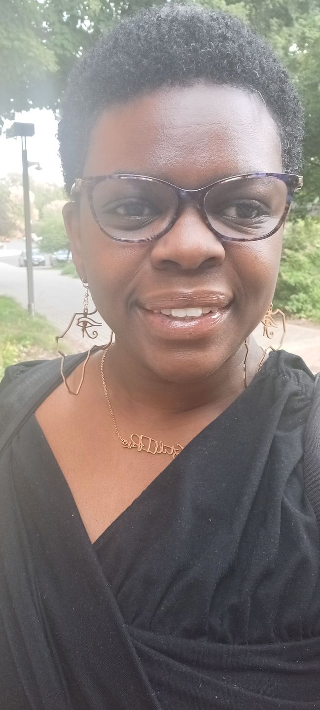 Customer photo review of African Map with Eye of Horus Symbol Earrings