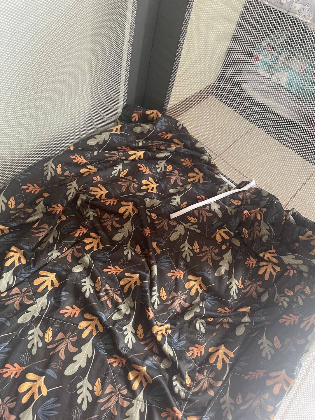 Customer photo review of Patterned Machine Washable Reversible Indoor/Outdoor Quilted Water Resistant Play Mat Blanket
