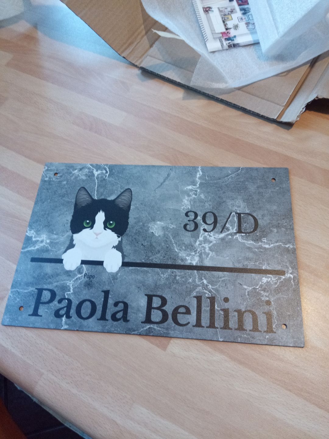 Customer photo review of Numero civico effetto marmo - Targa per porta personalizzata