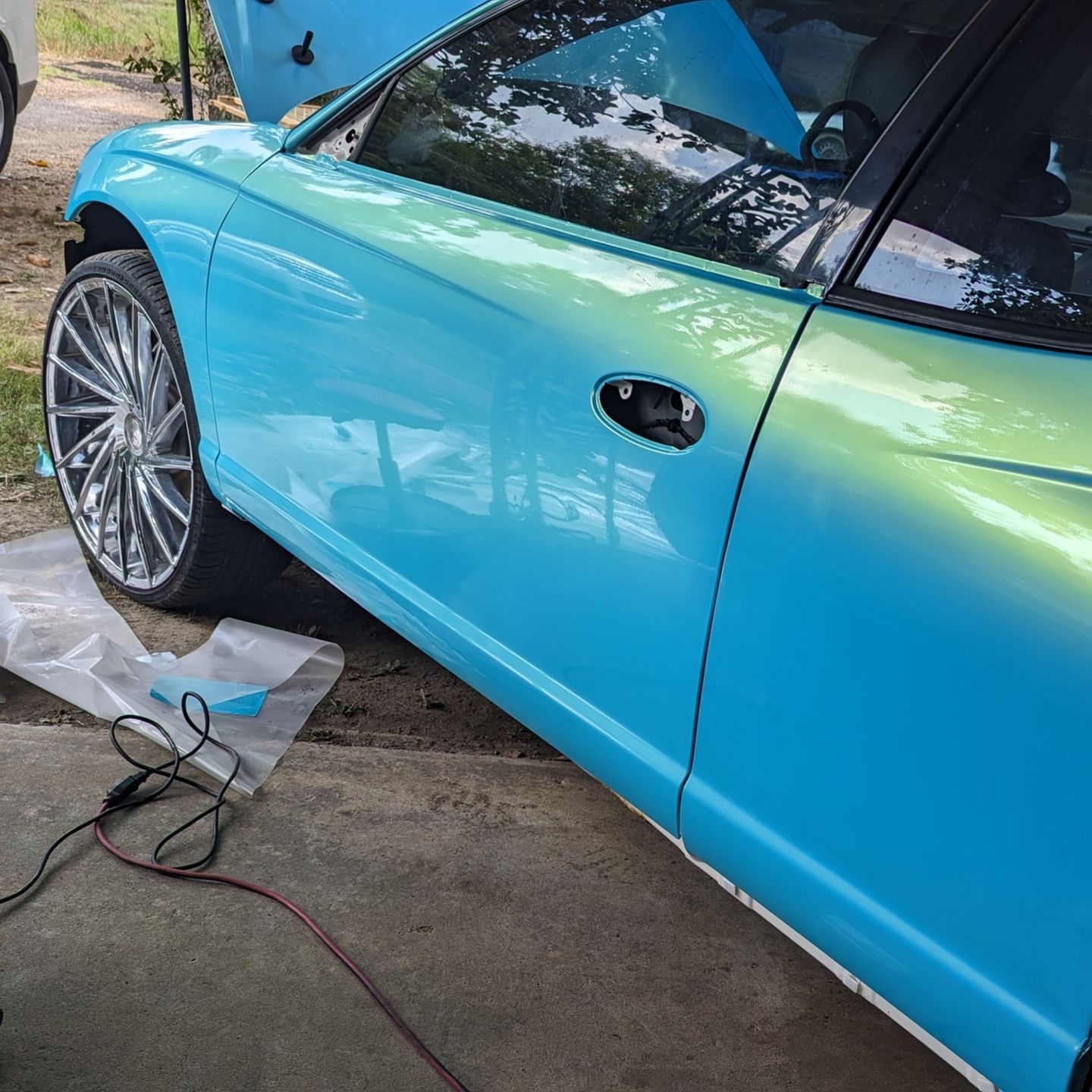 Customer photo review of Candy Metallic Neon Ice Blue Vinyl Wrap