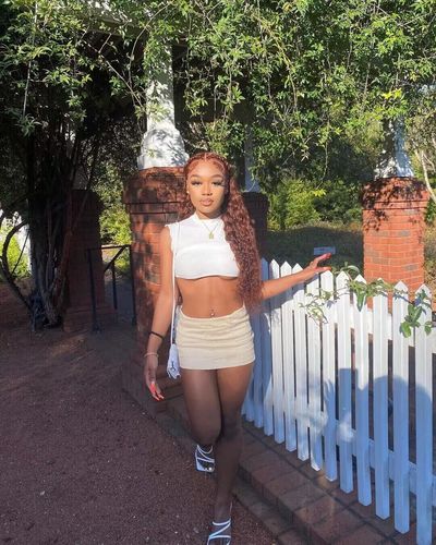 Customer photo review of Reddish Brown Color Curly Auburn Hair 13x4 Transparent Lace Front Wig