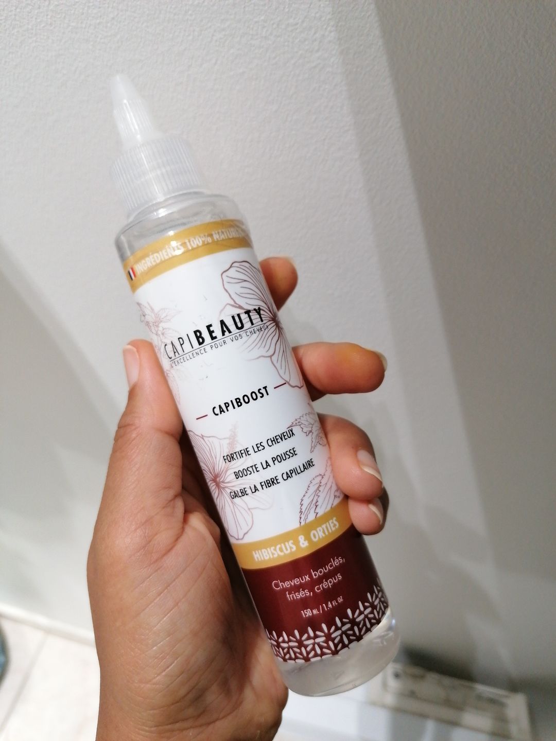 Customer photo review of Sérum Capiboost Hibiscus & Orties 120ml pour la pousse des cheveux bouclés frisés crépus