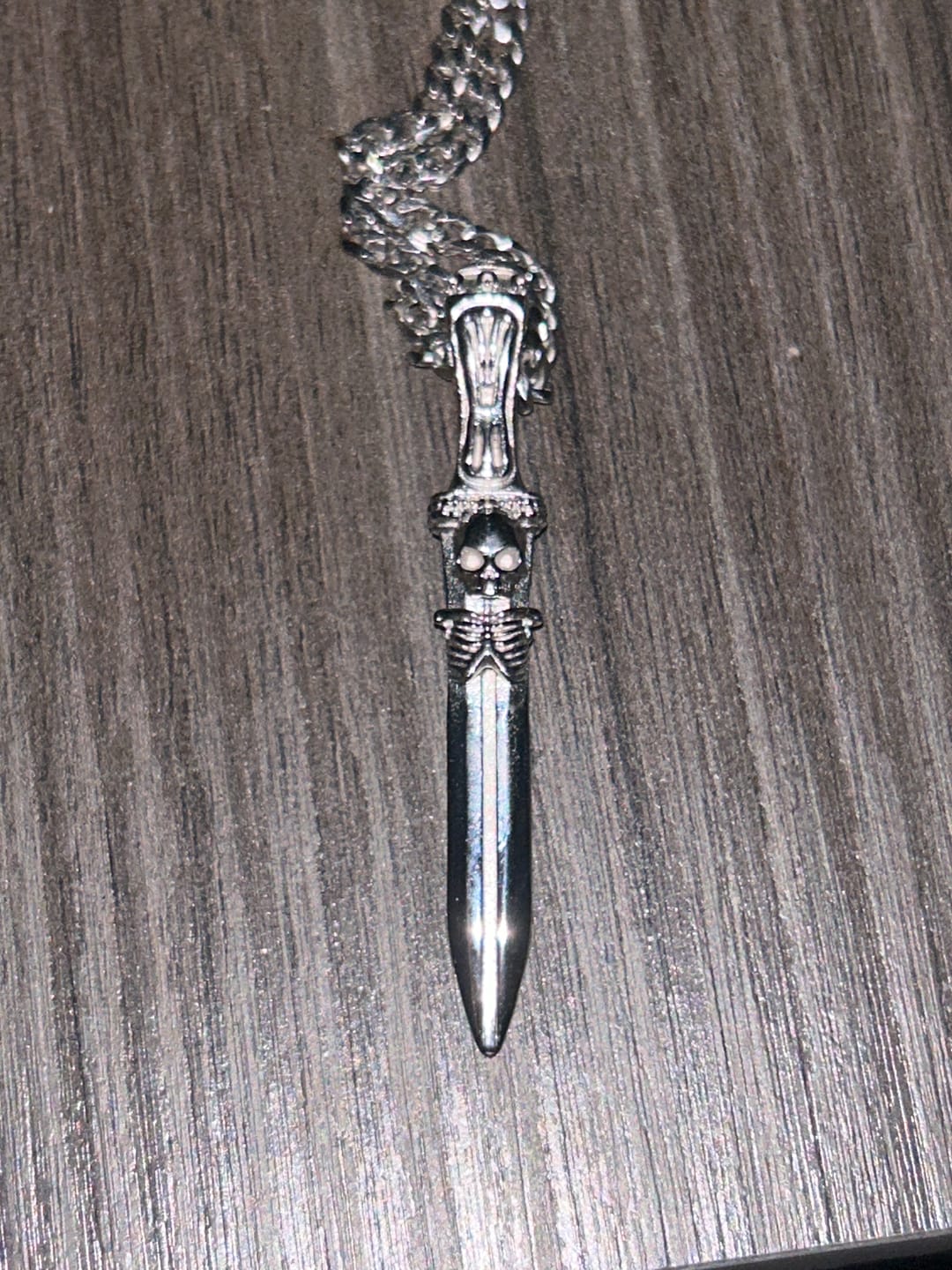 Customer photo review of CATACOMB SWORD PENDANT