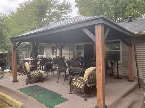 Customer photo review of EROMMY 12'x16' Ultra-Thick Columns and Beams Hardtop Gazebo with Faux Wood Grain Aluminum Frame, Vertical Stripe Galvanized Steel Single Roof with Netting and Curtains