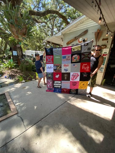 T-shirt quilt with music, travel themes by Carol from FL