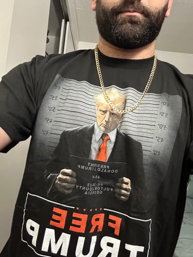 Customer photo review of Trump Mugshot Sign T-Shirt