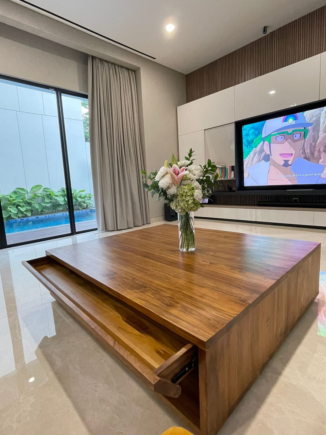 Customer photo review of Timeless Teak Coffee Table with Seamless Storage
