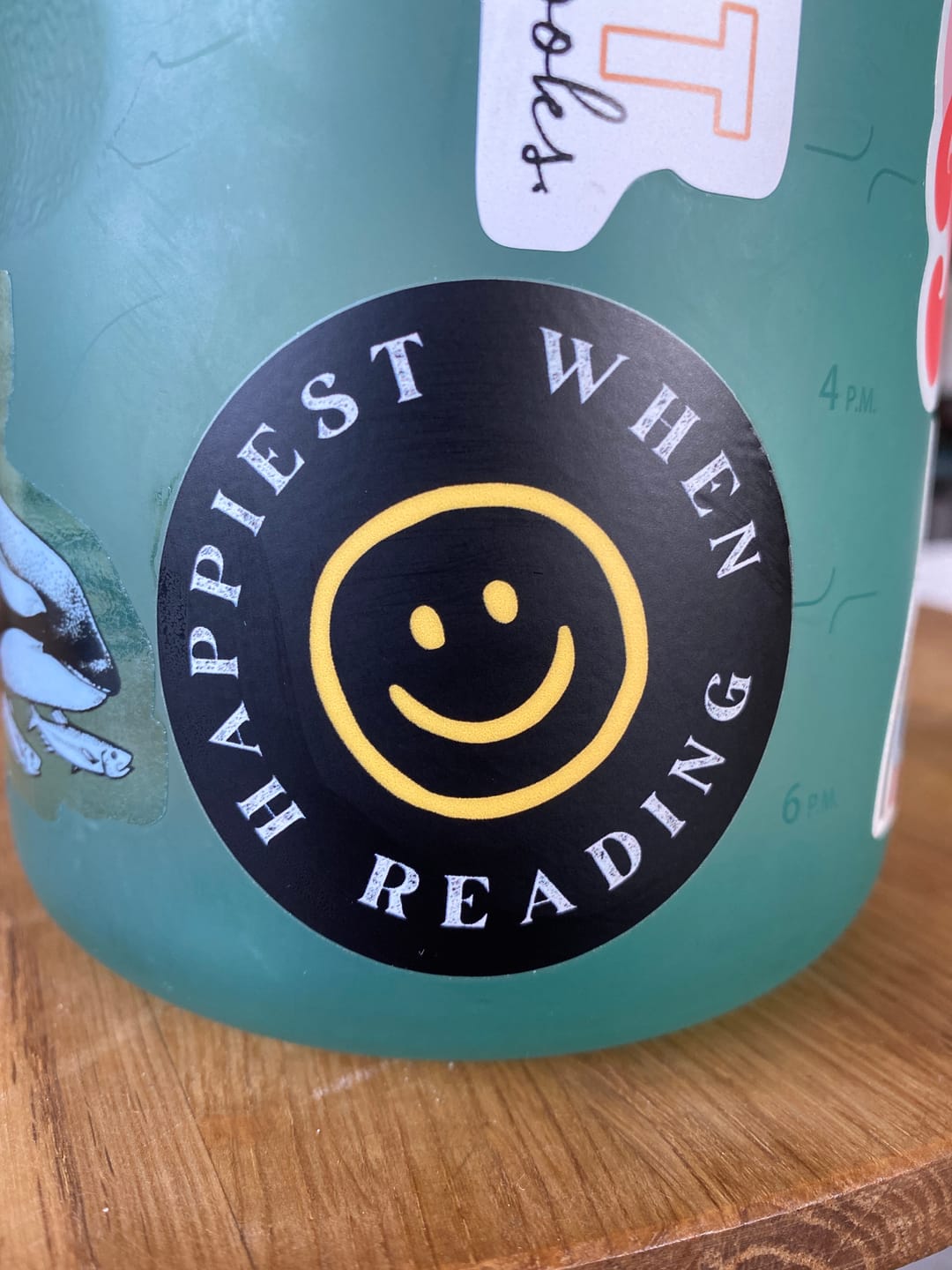 Customer photo review of happiest when reading sticker