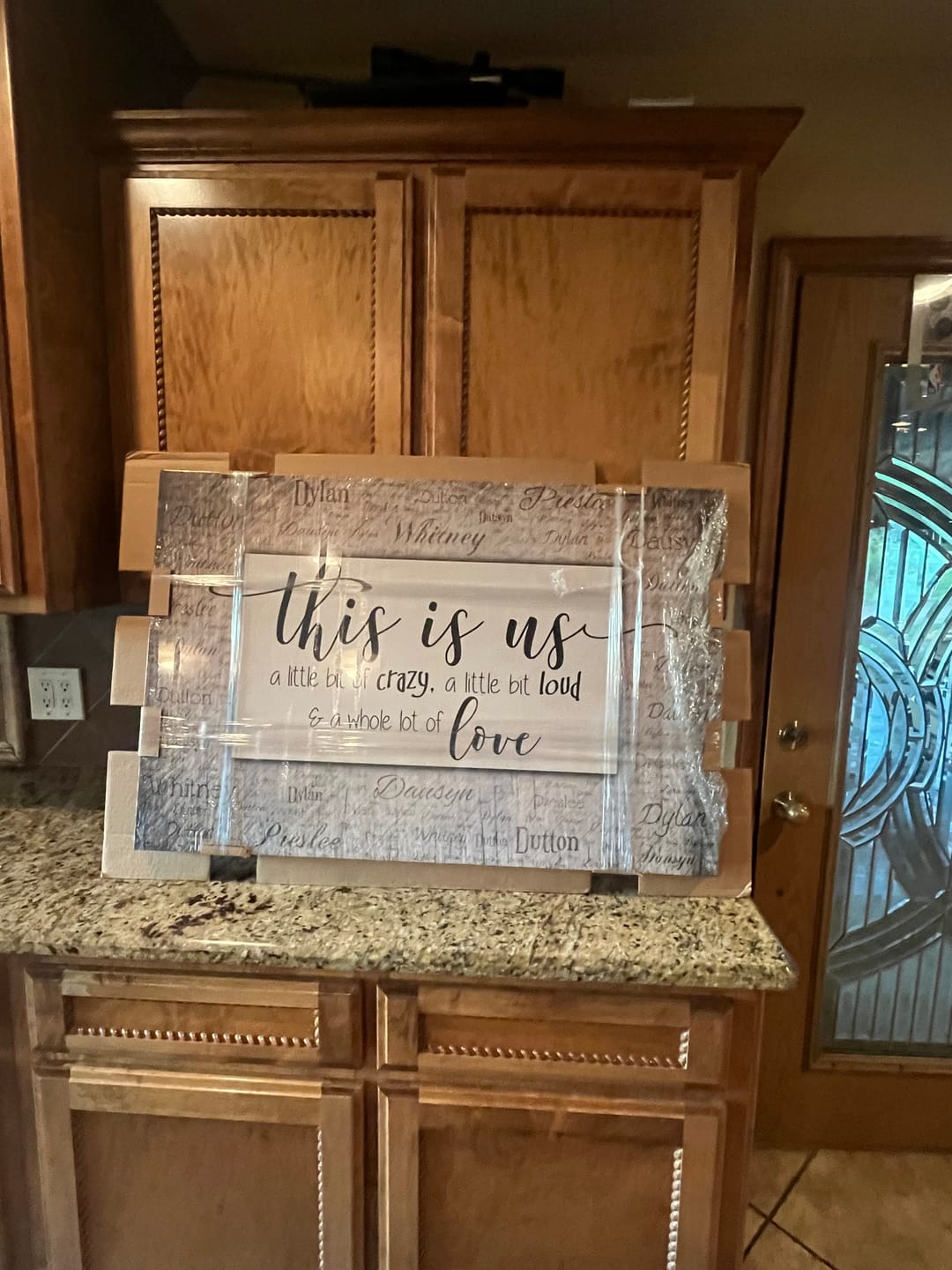 Customer photo review of Personalized "This Is Us" With Names on Background Premium Canvas