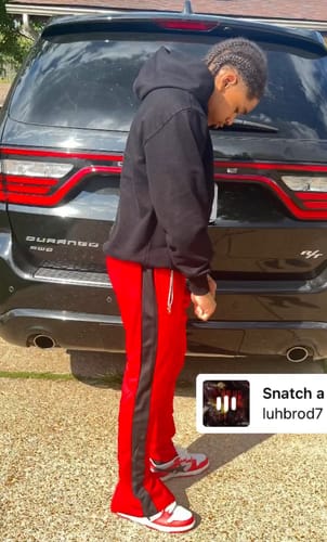 Customer photo review of Premium Side Stripe Zip Pocket Track Pants (Red - Black)