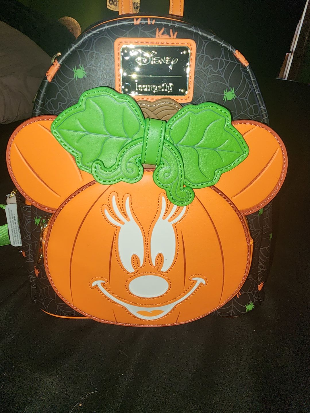 Customer photo review of 707 Street Exclusive - Loungefly Disney Glow in the Dark Pumpkin Minnie Mouse Mini Backpack