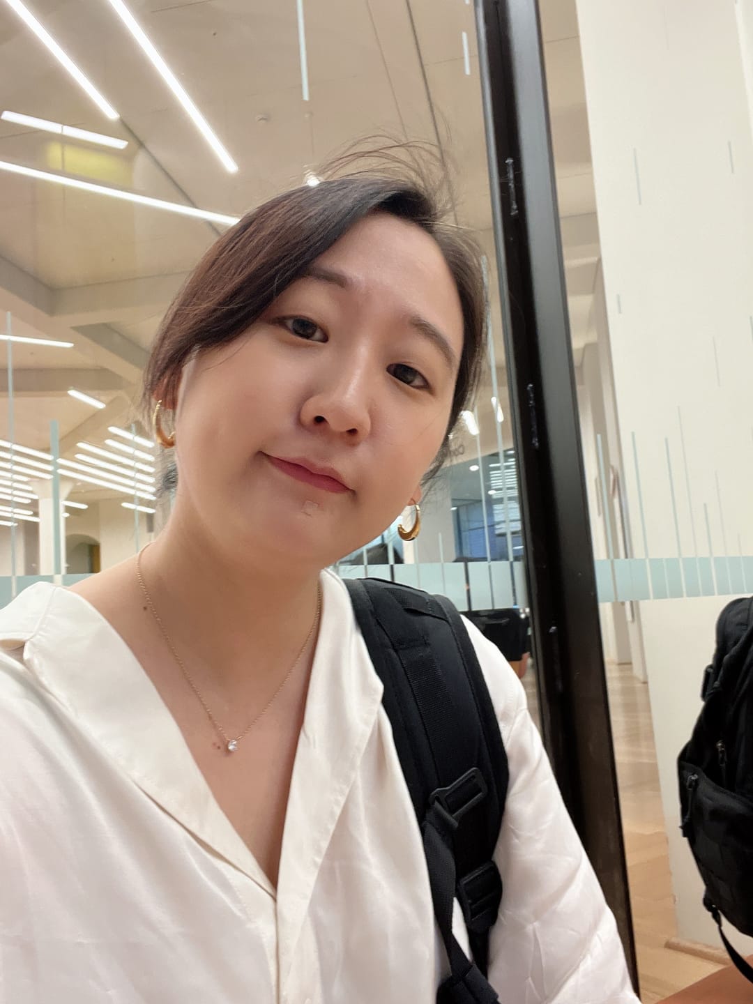 Customer photo review of Classic Drop Hoop Earrings